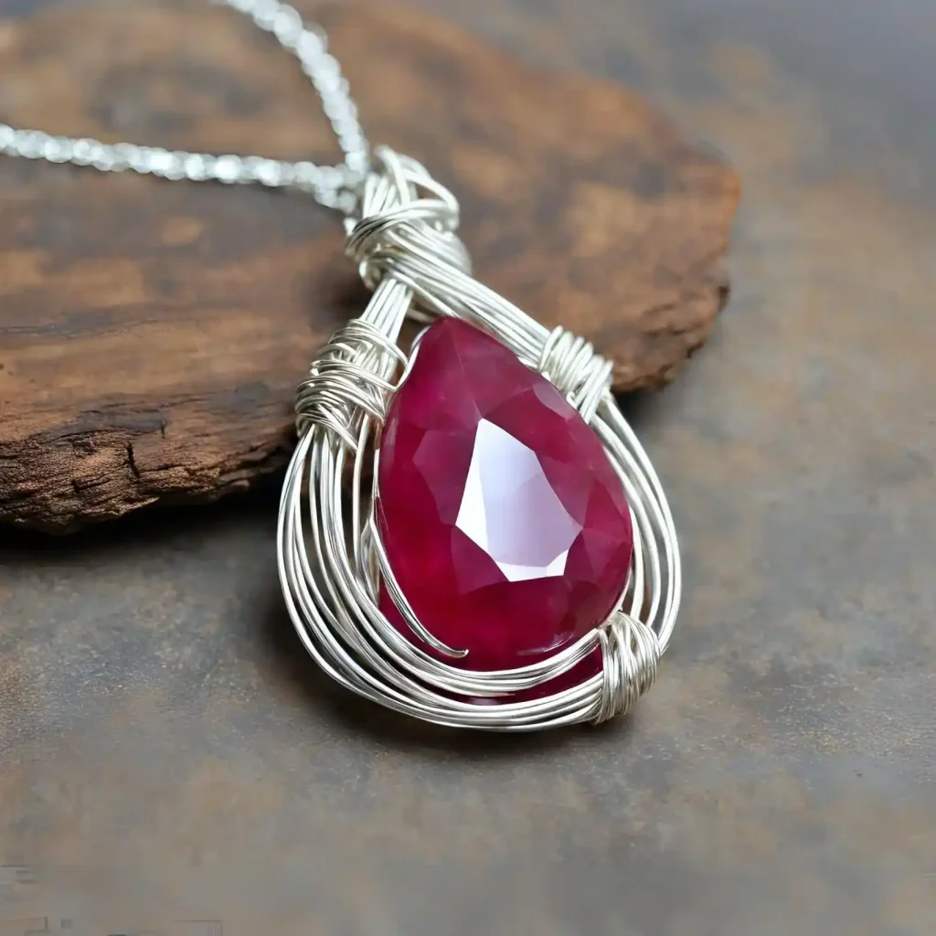 ruby pendant wrapped in wire